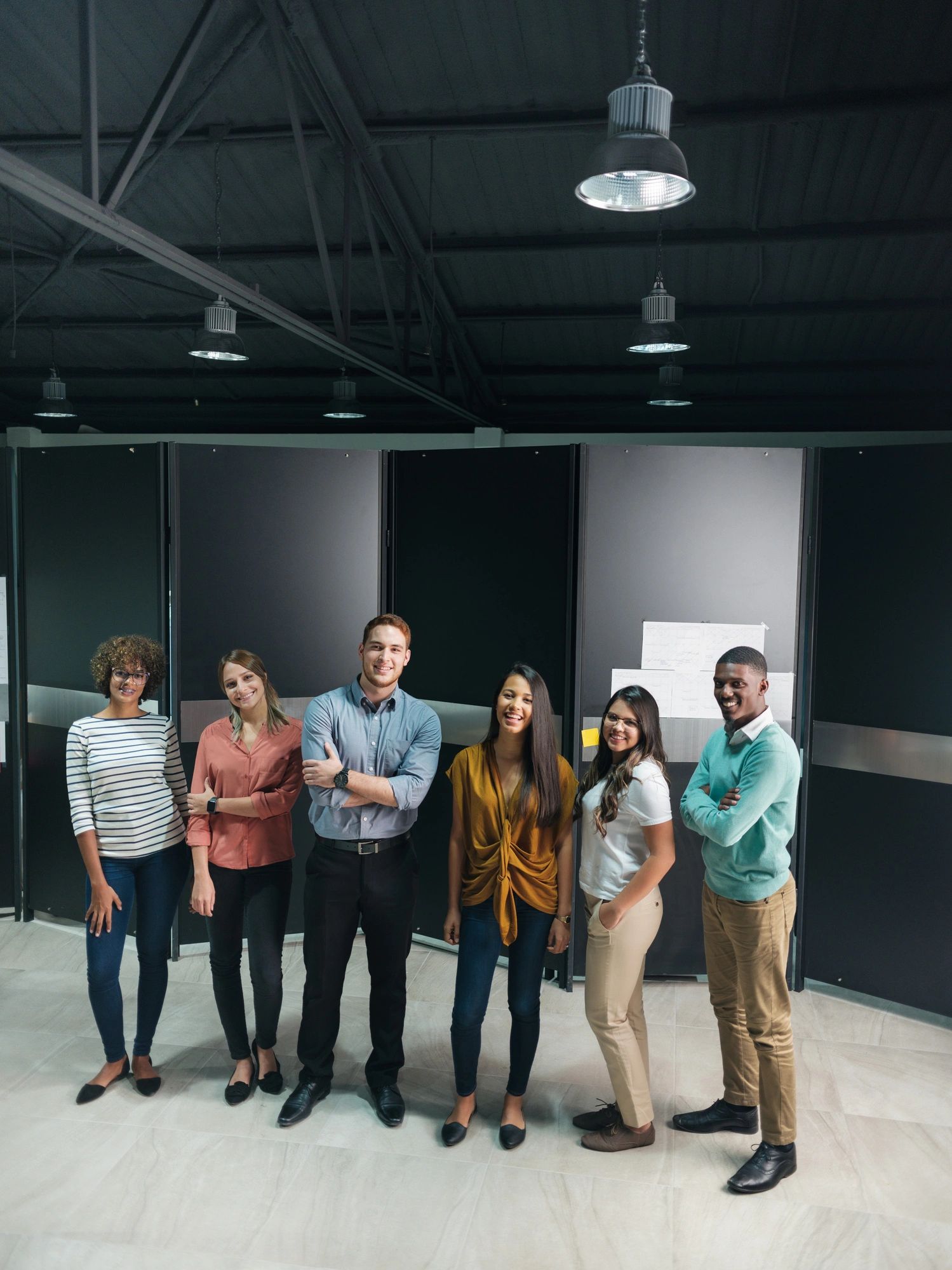 Professional technology team standing together