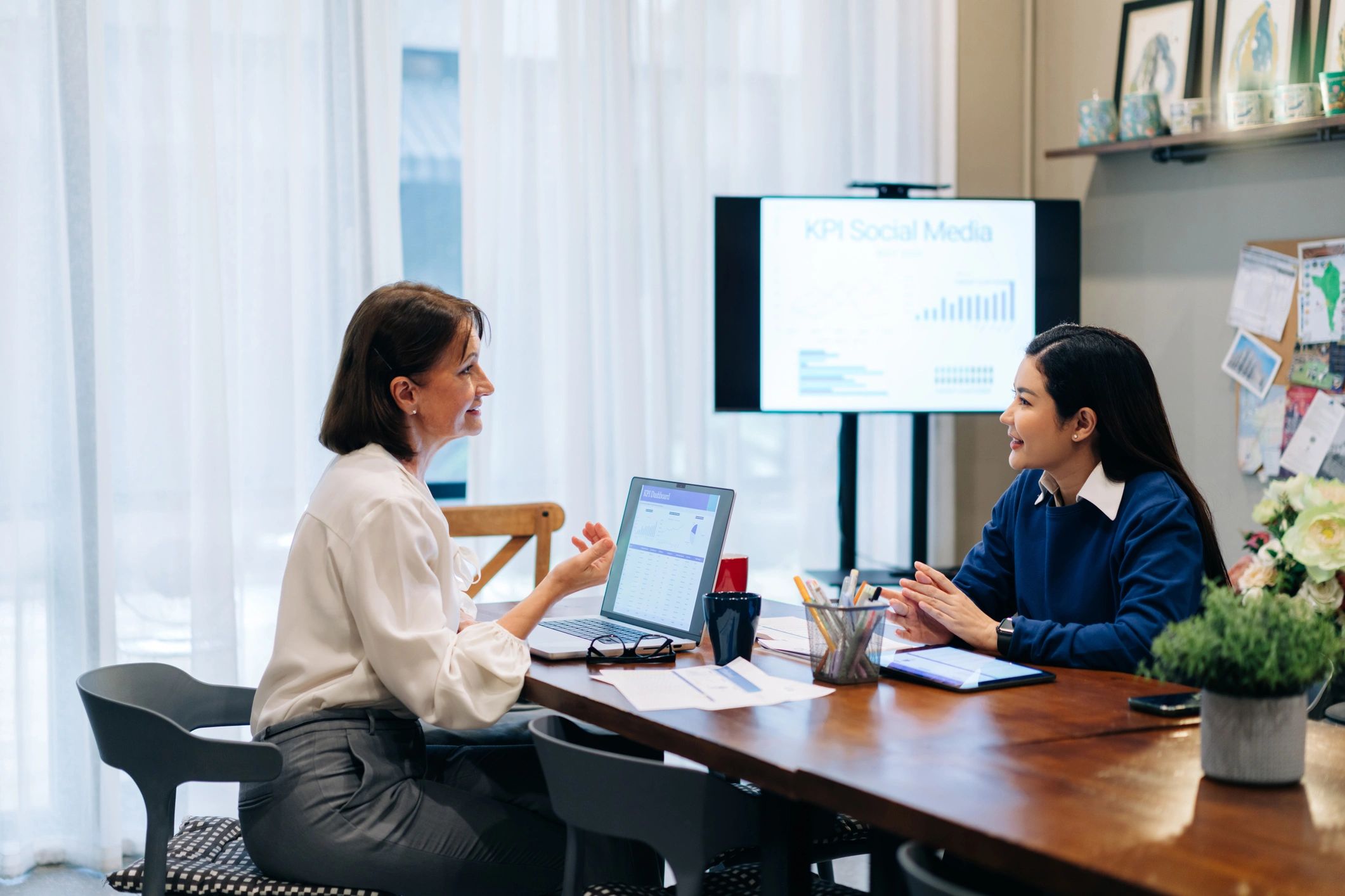 Business technology consultants meeting in a modern office